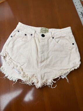 Light Cream Frayed Hem Denim Shorts by Dollskill